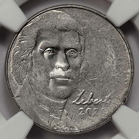 2009 Jefferson Nickel struck-through grease error showing weak and partially missing design elements in the LIBERTY area