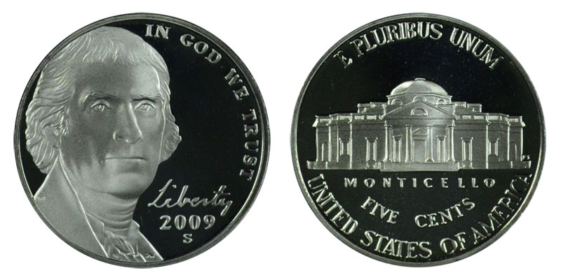 Grading strip showing four 2009 Jefferson Nickels in progression from worn circulated to gem uncirculated condition